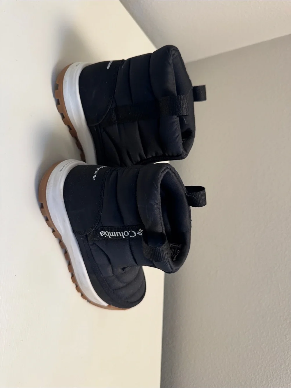 Columbia Kids Black Winter Boot with White Midsole and Brown Outsole